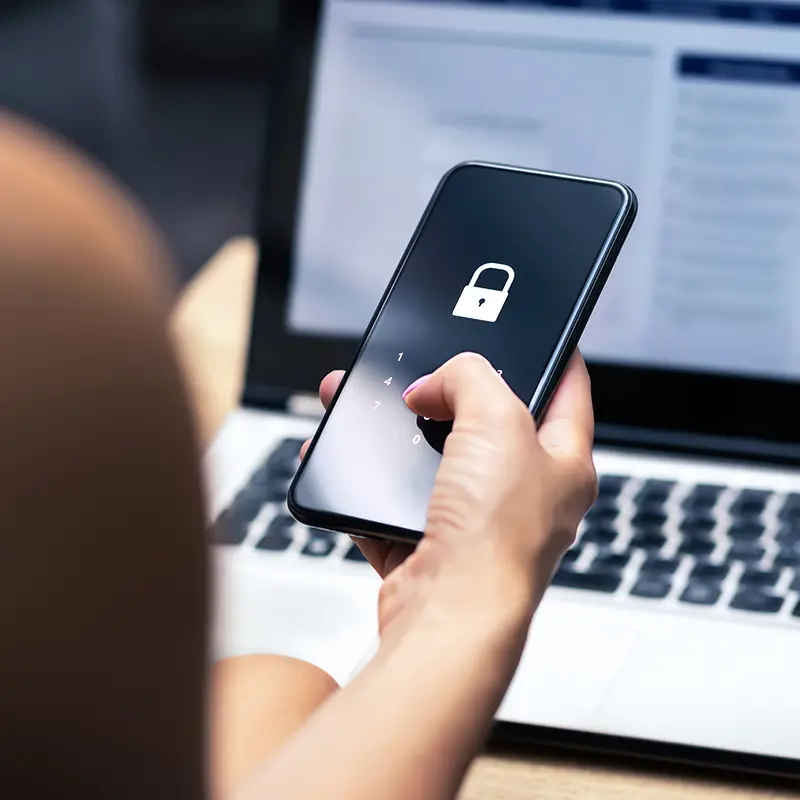 woman holding secure mobile phone